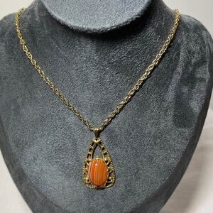 Vintage Orange Stone Ornate necklace. Gold tone rope chain